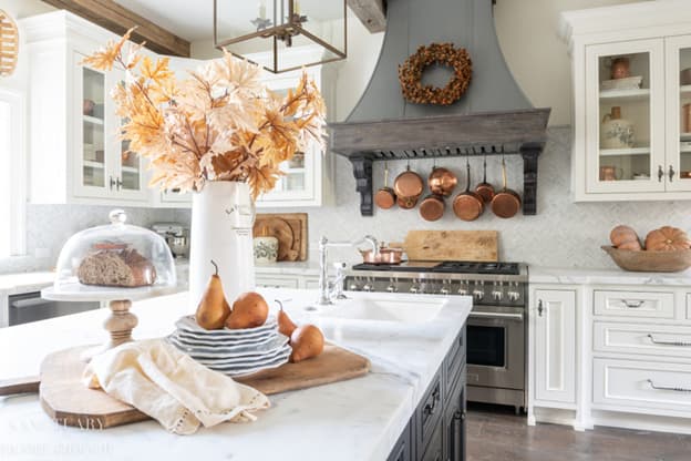 Kitchen with copper accents and fall leaves