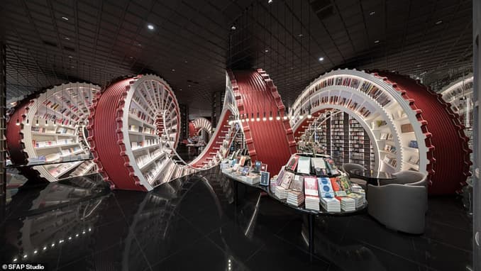 Stranger than fiction: A giant sideways spiral bookcase is the spectacular main attraction in this surreal new bookstore in China
